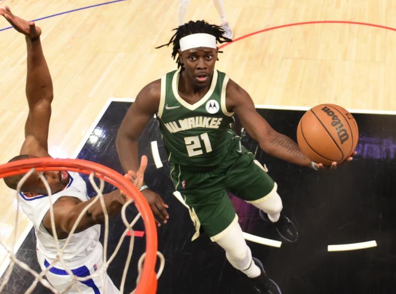 九游APP包含蒂姆连续十二场比赛得分超过出色发挥，雄鹿不断突破！全场沸腾不已的词条